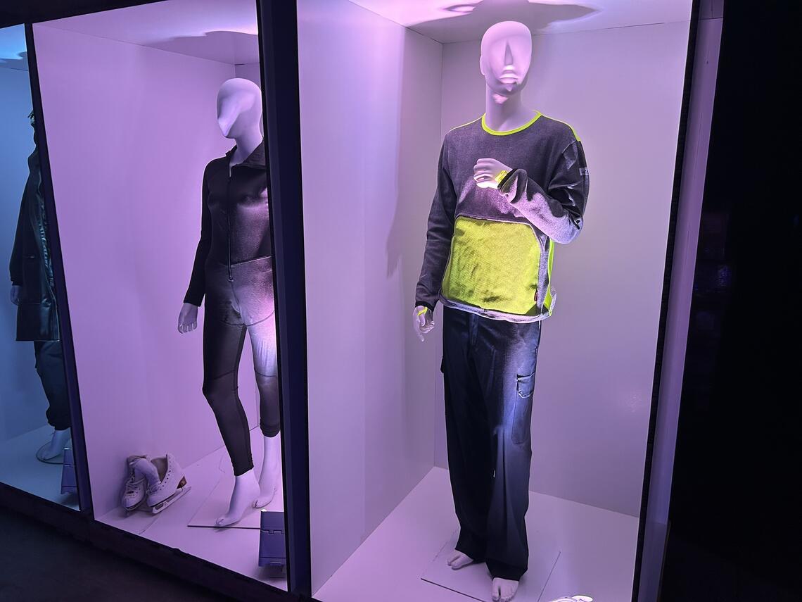Store mannequins wearing CUTEX garments.